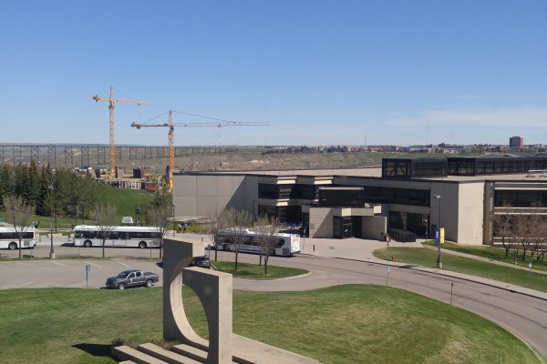 Justin Orare snapped this pic of campus with Big and Little Yeller in view from his vantage point while working on Piikani House recently!